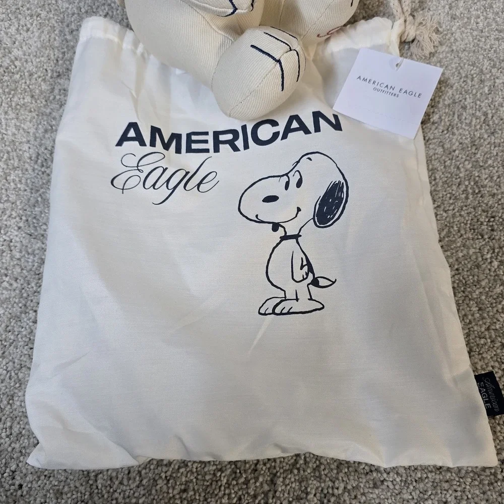 Snoopy Peanuts American Eagle Novelty ‎ Stuffed Animal And Drawstring Bag